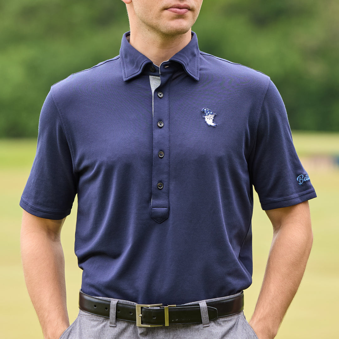 Bettinardi x Field Day Sporting Co. Wizard Runboy Ford 5 Button Polo (Navy)- front lifestyle